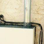 The two-screw connector seen on the top right corner of this panel is not listed for exterior use. It is not water tight.