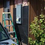 This exterior wall was opened up to install a new 200 amp service panel. You can see the black felt vapor barrier is being replaced.